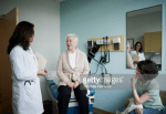FamilyMeetWithDoctor.GettyImages.ThomasBarwick